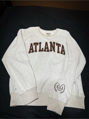 Atlanta Crewneck Sweatshirt in Cream with Brown Lettering